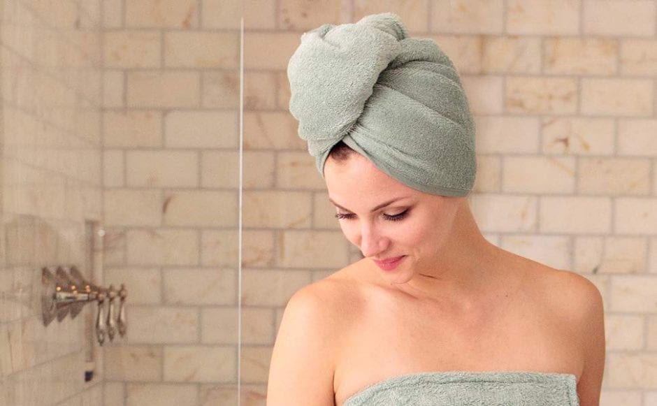 Tips To Dry Your Hair Without Any Heat Appliances   Wrap Hair With Towel 940x581 