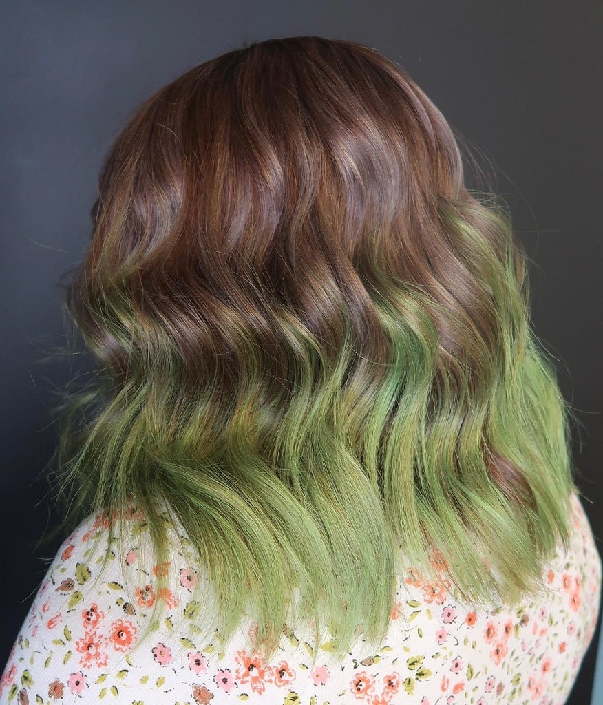 faded green dip dye wavy hair